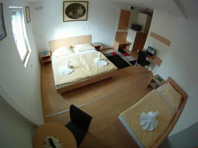 an overhead view of a bedroom with a bed at Hotel Galaksija Trebnje in Trebnje