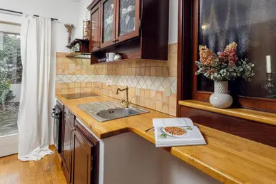a kitchen with a sink and a counter top at HoMEMADE in Ljubljana
