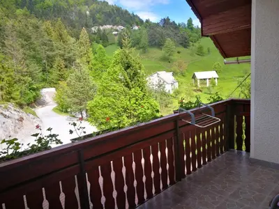 a balcony with a view of a mountain at Apartma Teloh in Kopačnica