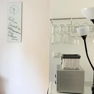 a lamp sitting on top of a printer in a room at Apartment Baba Yaga 12 in Rogaška Slatina