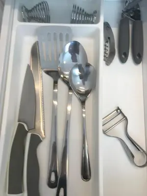a group of utensils sitting in a drawer at My Nest, 5 minutes to the Dragon Bridge in Ljubljana