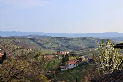 a view of a small village in a valley at Pri Marjotu in Kojsko