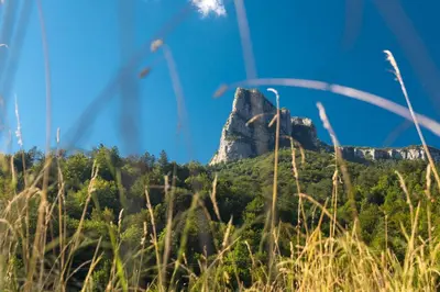 a view of the lion rock from afar at Vila Rozi, Osilnica - vacation house Pr' Vili Rozi in Osilnica