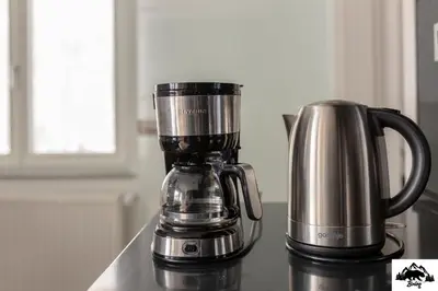 a coffee maker sitting on top of a counter at Brlog in Zgornje Gorje