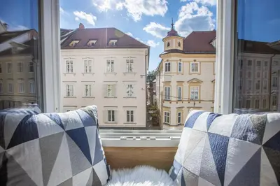 a window with a view of a building at Old Quarter Residence in Ljubljana
