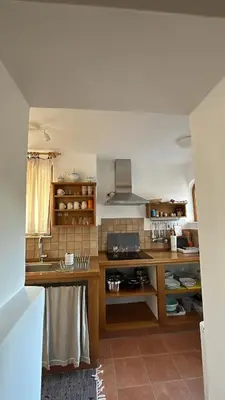 a kitchen with a sink and a counter top at Apartment Erlah in Rateče