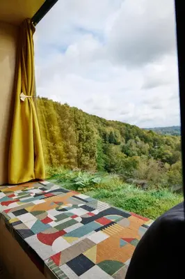 a window with a view of a mountain at Tri Vile Estate, a piece of paradise in Kozjansko in Podčetrtek