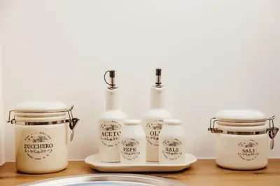 a group of four bottles and jars on a counter at Drive Caffe Apartments in Trzin