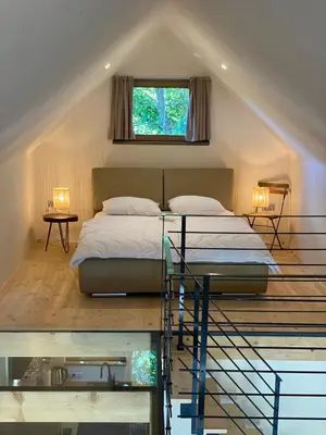 a bedroom with a bed and a window in a room at GORIČKE IŽE in Križevci