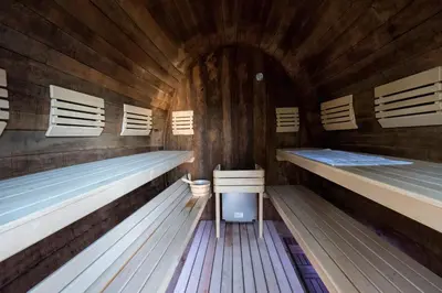 a wooden cabin with three bunk beds in it at GORIČKE IŽE in Križevci