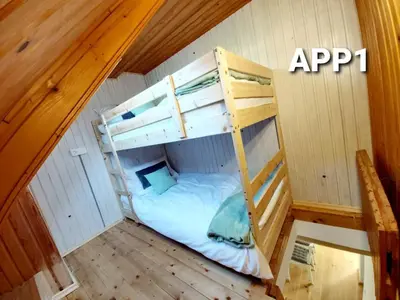 an overhead view of a bunk bed in a room at Alpine Village Home in Bohinj