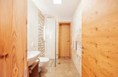 a bathroom with a toilet and a sink at Apartment Jezerca - Krvavec in Cerklje na Gorenjskem
