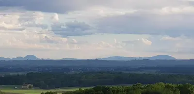 a view of a valley with mountains in the distance at Holiday house VilAna in Puconci