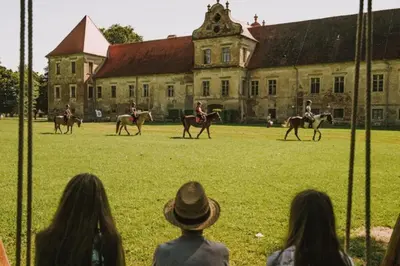 a group of people riding horses in front of a building at Holiday house VilAna in Puconci