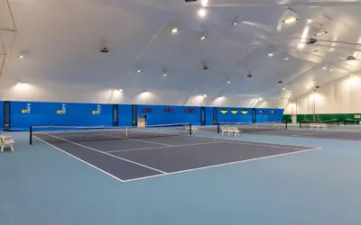 a tennis court with two tennis courts at Holiday house VilAna in Puconci