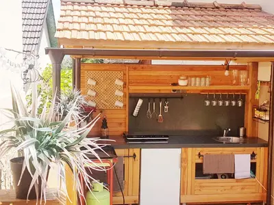 a kitchen with a counter with a sink and a counter top at RIVER KOLPA APARTMENT, Griblje ob reki Kolpi in Gradac