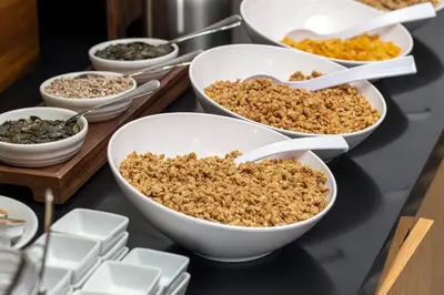 a group of bowls of food on a counter at Holiday Inn Express - Ljubljana by IHG in Ljubljana