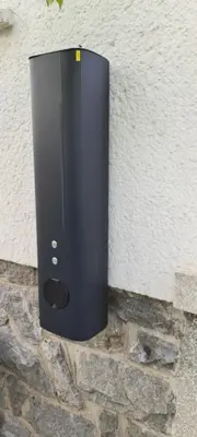 a black speaker on the side of a building at Apartments Andrej - Optuj in Ptuj