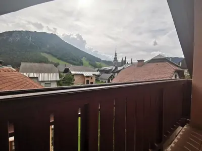 a view from the balcony of a town with roofs at Apartment Eli in Kranjska Gora