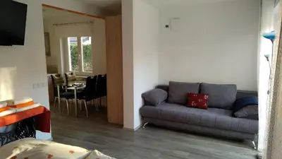 a living room with a couch and a table at Apartma Golob in Zgornja Kungota