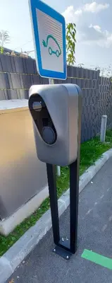 a parking meter with a sign on top of it at Apartments & Burgers REZIDENCA PIPANOVA in Ljubljana