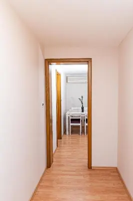 an empty hallway with a table in a room at Zelena Oaza - B&B in Miklavž pri Ormožu