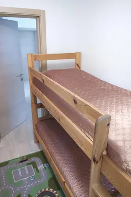 a bedroom with a bunk bed in a room at Villa Melody in Bohinj