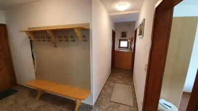 a room with a closet with a wooden shelf at Apartma Majda in Kranjska Gora