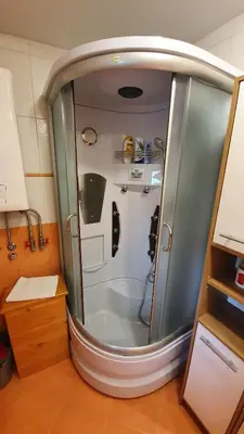 a shower in a small room with at Apartma Majda in Kranjska Gora