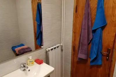 a bathroom with a sink and a mirror at ZRM center in Idrija