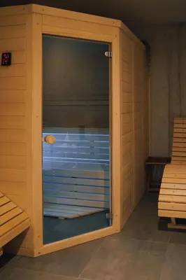 a large glass door of a sauna at SKED'N in Bled
