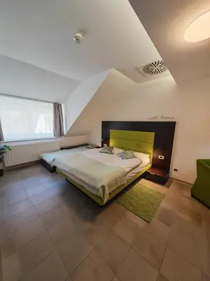 a bedroom with a large bed in a room at Apartment Klara in Kranjska Gora