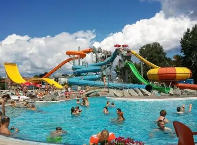 a group of people in a pool at a water park at Apartma Julija Hiška 59 in Čatež ob Savi