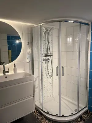 a bathroom with a shower and a sink at Park in Ljubljana