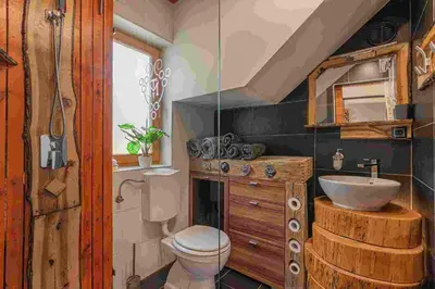 a bathroom with a toilet and a sink at Vineyard cottage Matej in Trebnje