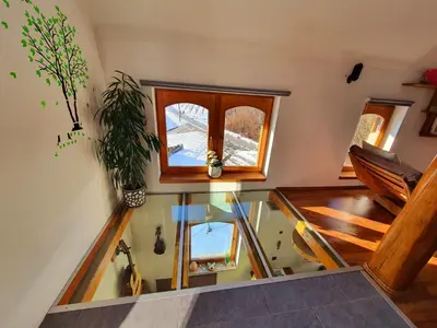 a view of a room with a window and a staircase at Vineyard cottage Matej in Trebnje