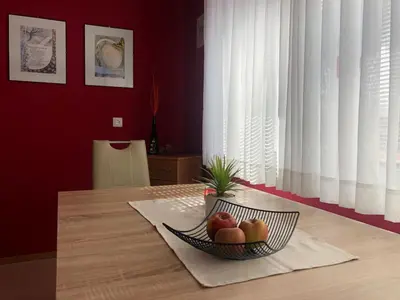 a bowl of fruit on a table in a room at Apartma Kreda in Mojstrana