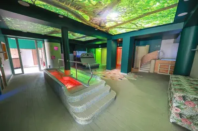 a room with stairs and a ceiling with lights at Boutique Hotel Dobrna - Terme Dobrna in Dobrna