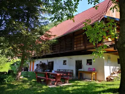 a building with a picnic table in front of it at Apartment Vrhivšek in Frankolovo