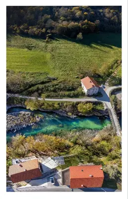 an aerial view of a river with a house and a road at Apartments Jez in Slappe dʼIdria