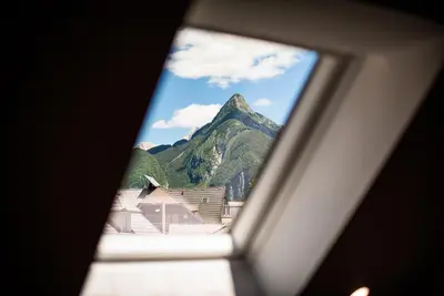 a view of a mountain through a window at Vila K29 in Bovec
