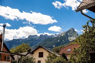 a view of the mountains from a village at Vila K29 in Bovec