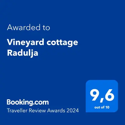 a screenshot of a phone with the text awarded to vivengard cottage radula at Vineyard cottage Radulja in Smarjeske Toplice