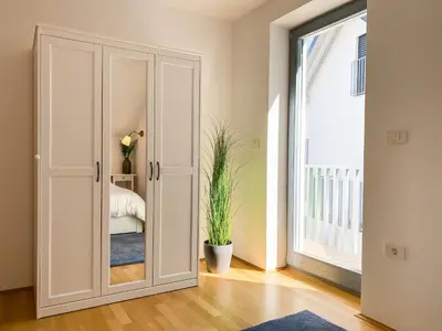 a room with a door with a plant in it at Lakeview Villa Bled in Bled