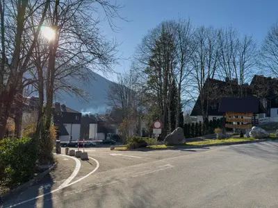 a street with a street light on the side of a road at Cozy Apartment Bovec in Bovec