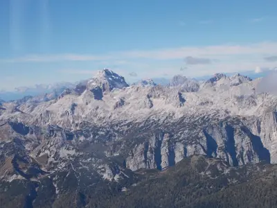 an aerial view of a snow covered mountain at Mountain house MINKA in Srednja Vas v Bohinju