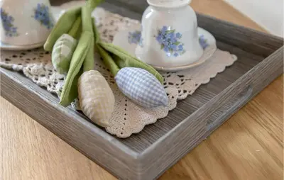 a wooden tray with seashells on a table at Lovely Home In Kojsko With Sauna in Kojsko