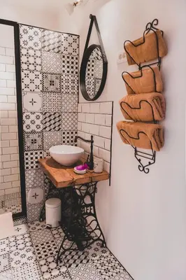 a bathroom with a sink and a mirror at Apartma Cici in Kobarid