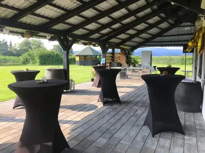 a group of tables and chairs on a patio at APP PARCELA CELJE in Celje