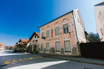 a building on the side of a street at B&B Vransko 29 in Vransko